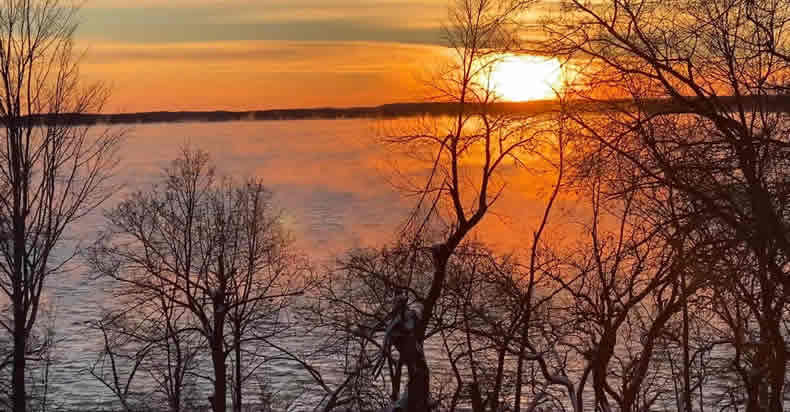 Watch the sunrise over Star Lake make the snow glisten